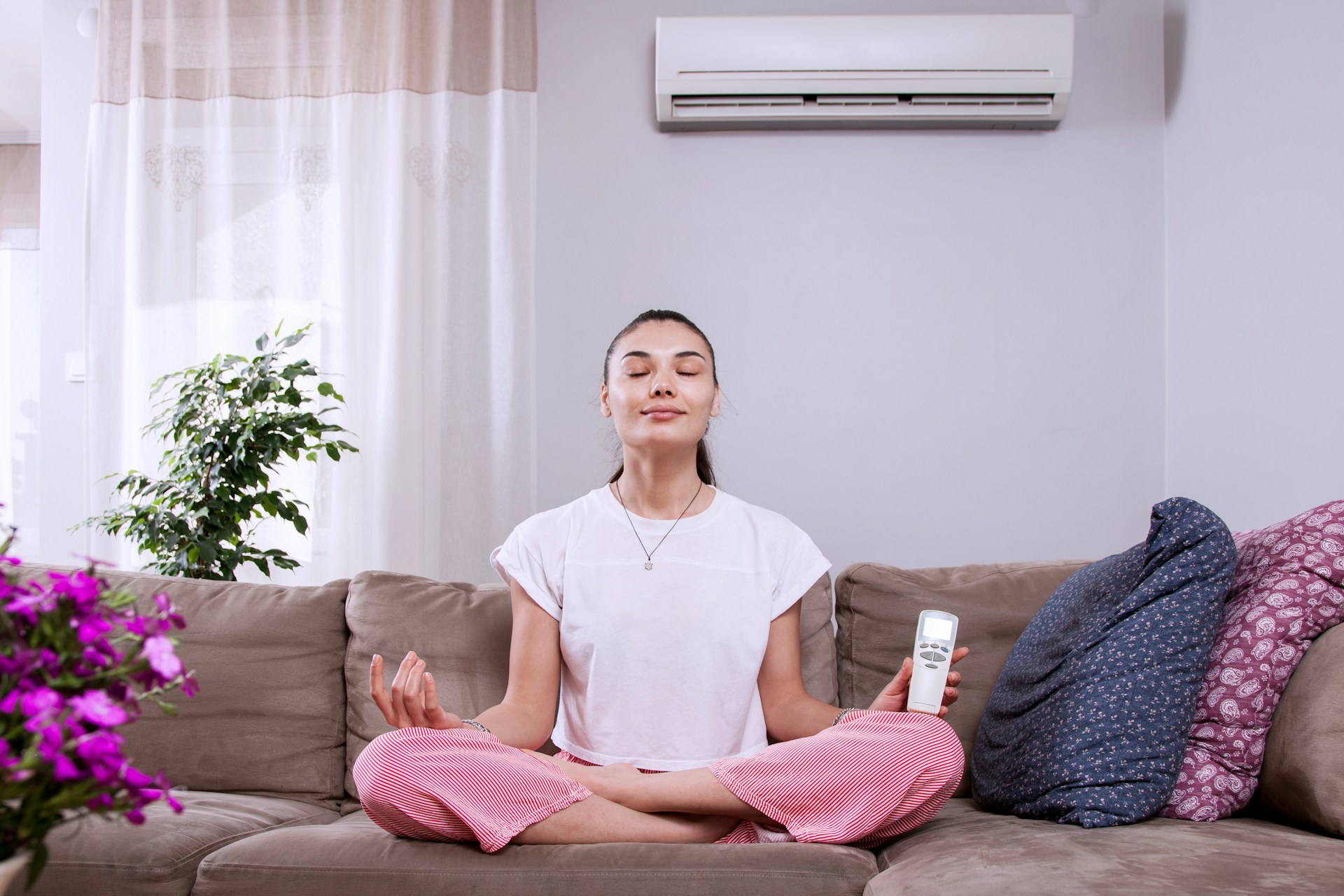 girl at home with ac system
